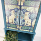 Teal Cabinet With Decorative Front
