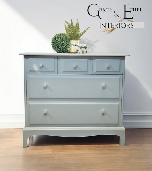 Stag Minstrel Chest of Drawers on Grey, Oversize bedside table
