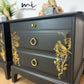 Matt Black Stag Minstrel bedside tables with gold floral and bird design. vintage nightstands. Teatray