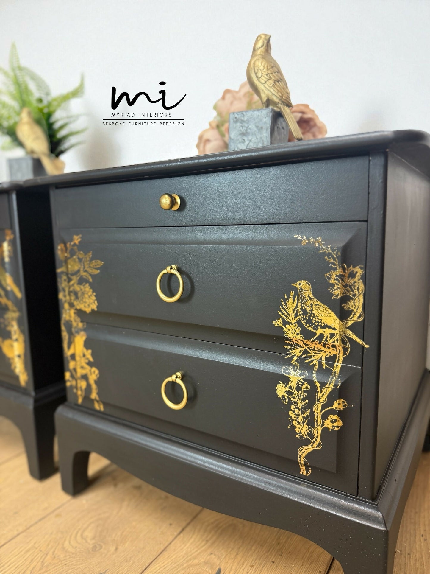 Matt Black Stag Minstrel bedside tables with gold floral and bird design. vintage nightstands. Teatray