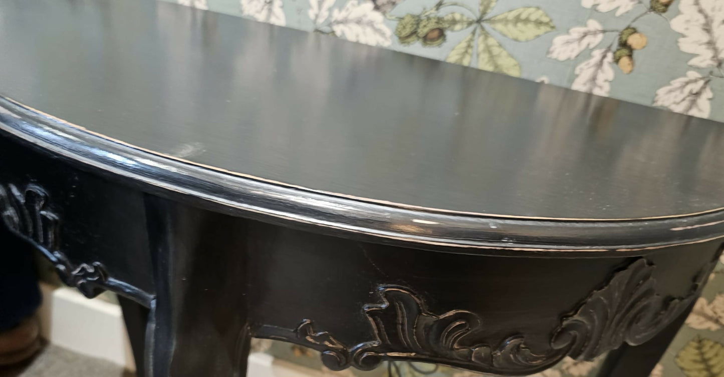 Reproduction Maison Demi Lune Console in black, manufactured by Gallery Direct Ltd