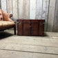 Antique leather trimmed chestnut brown campaign chest