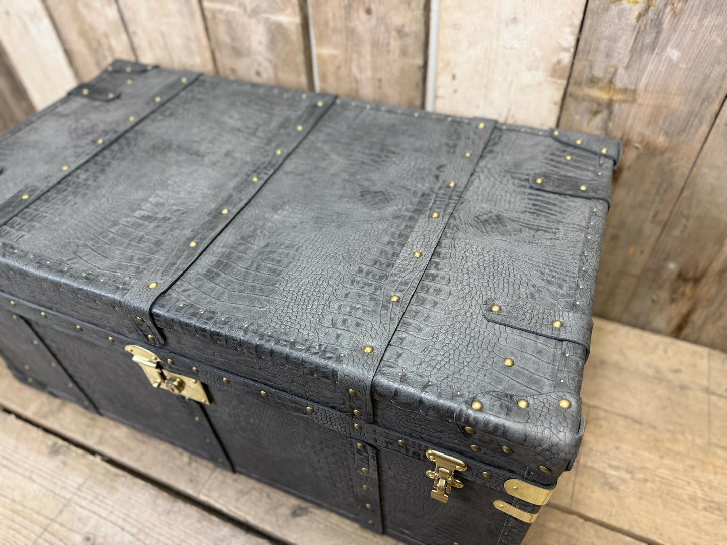 charcoal grey mock crocodile reception trunk