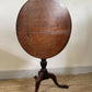 An Antique Oak Tripod Table