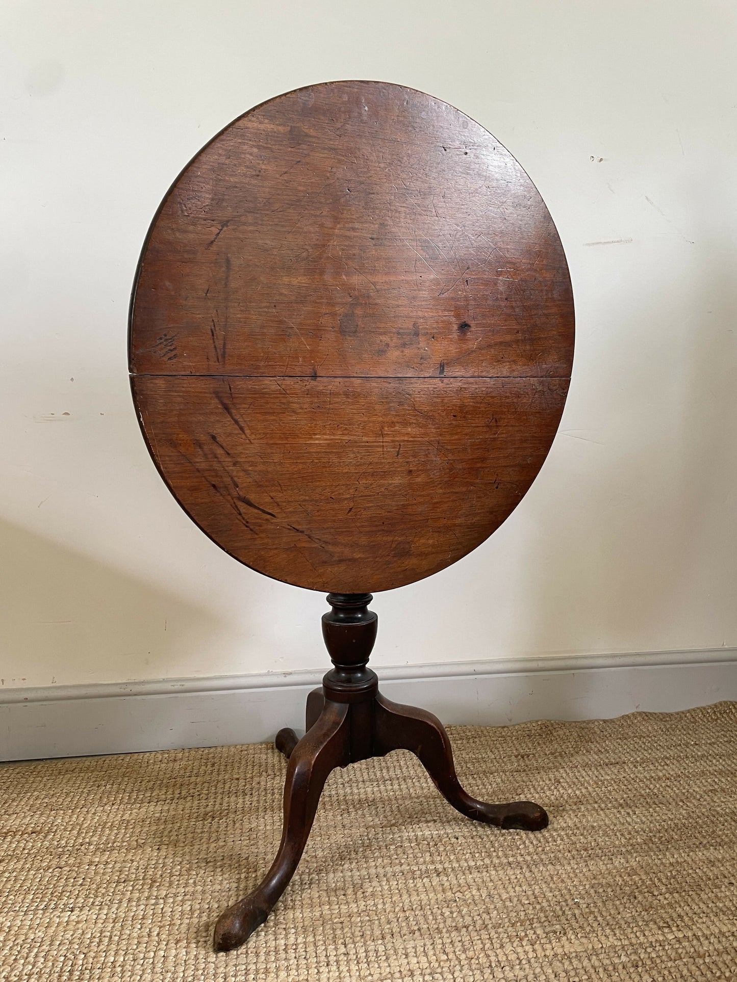 An Antique Oak Tripod Table