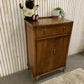Vintage Art Deco burr walnut veneer cupboard featuring two doors and one drawer.