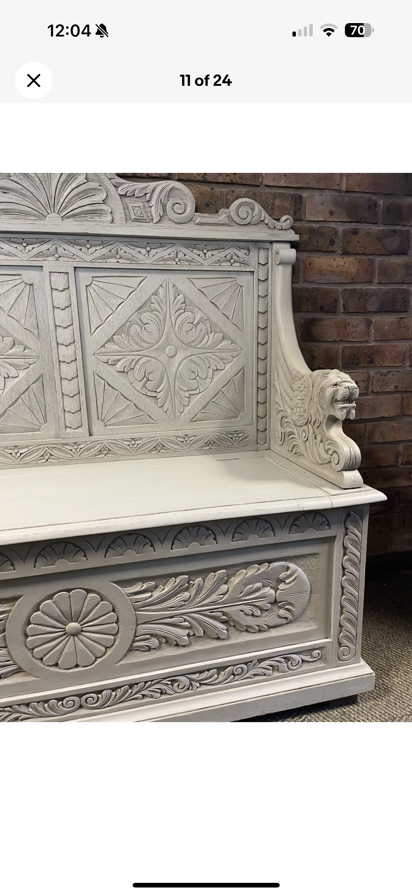 Edwardian antique Settle in solid oak with ornate carvings.