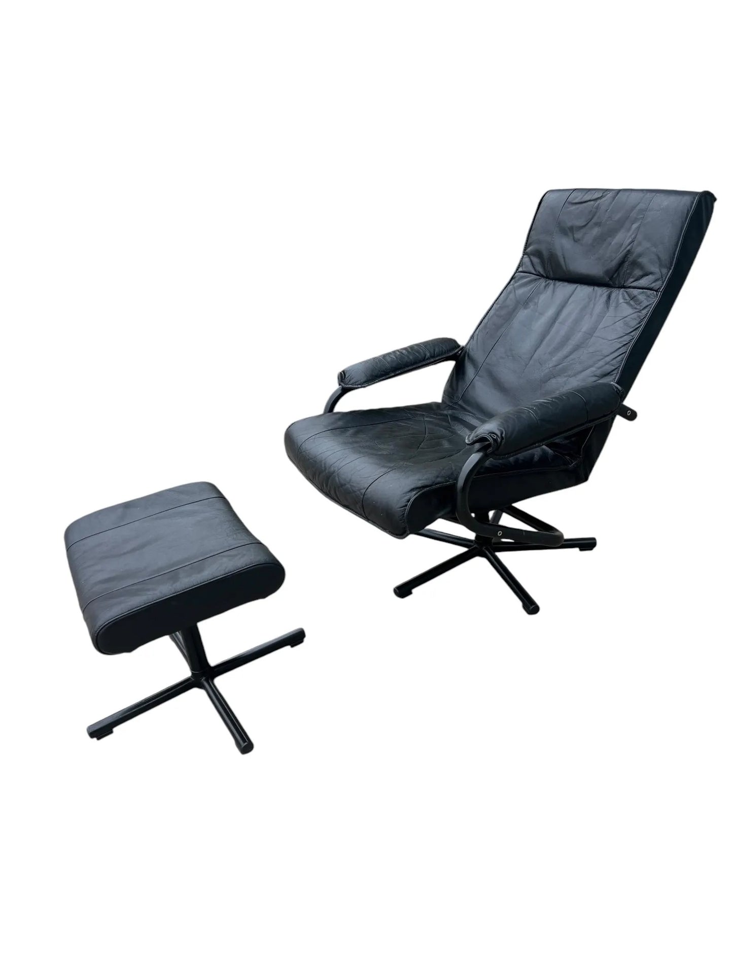 Black Mid century recliner swivel chair and stool in the manner of Kebe Mobler