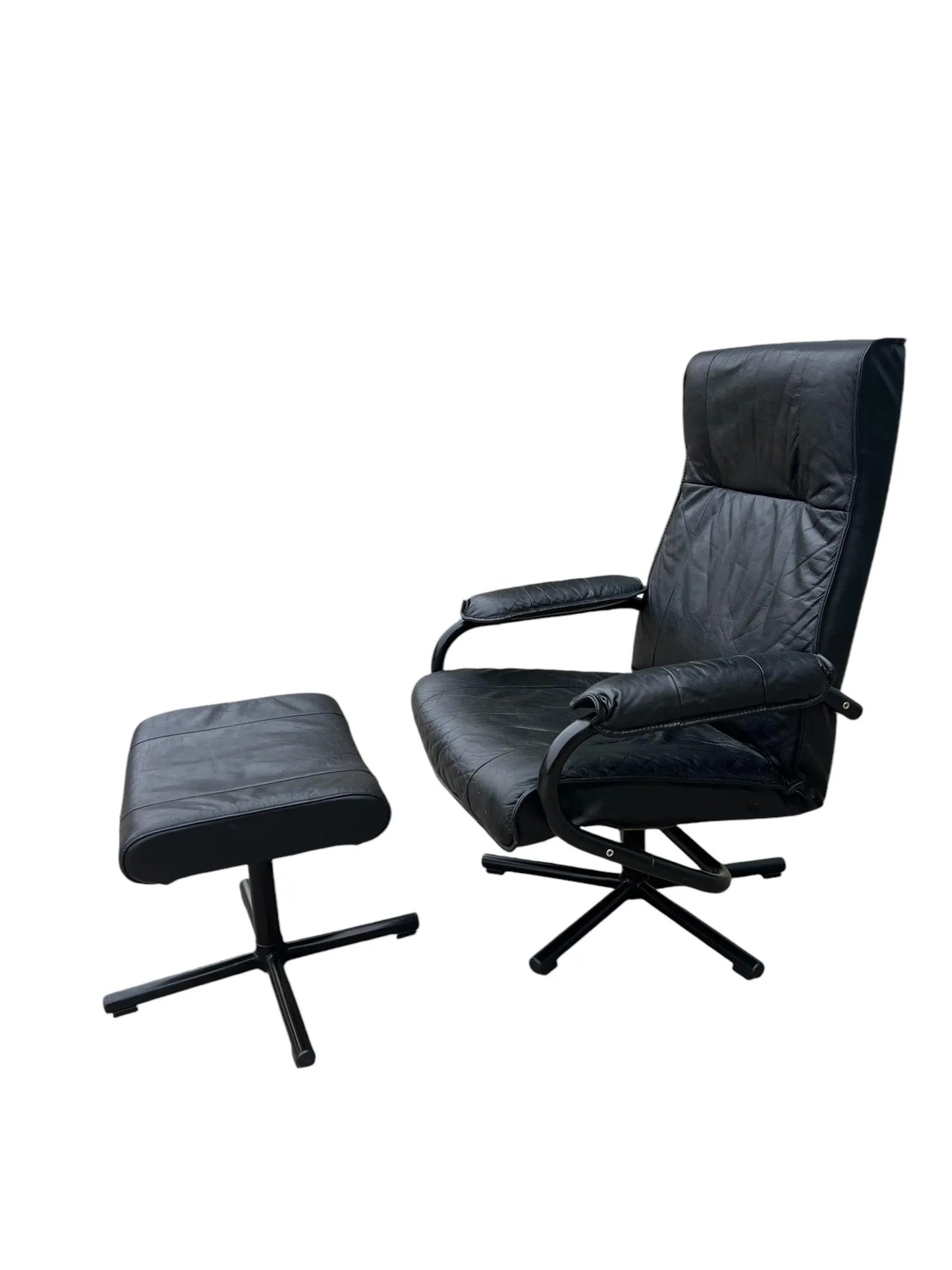 Black Mid century recliner swivel chair and stool in the manner of Kebe Mobler