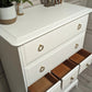 Stag minstrel white tallboy 7 drawer chest of drawers, professionally sprayed white furniture.