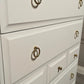 Stag minstrel white tallboy 7 drawer chest of drawers, professionally sprayed white furniture.