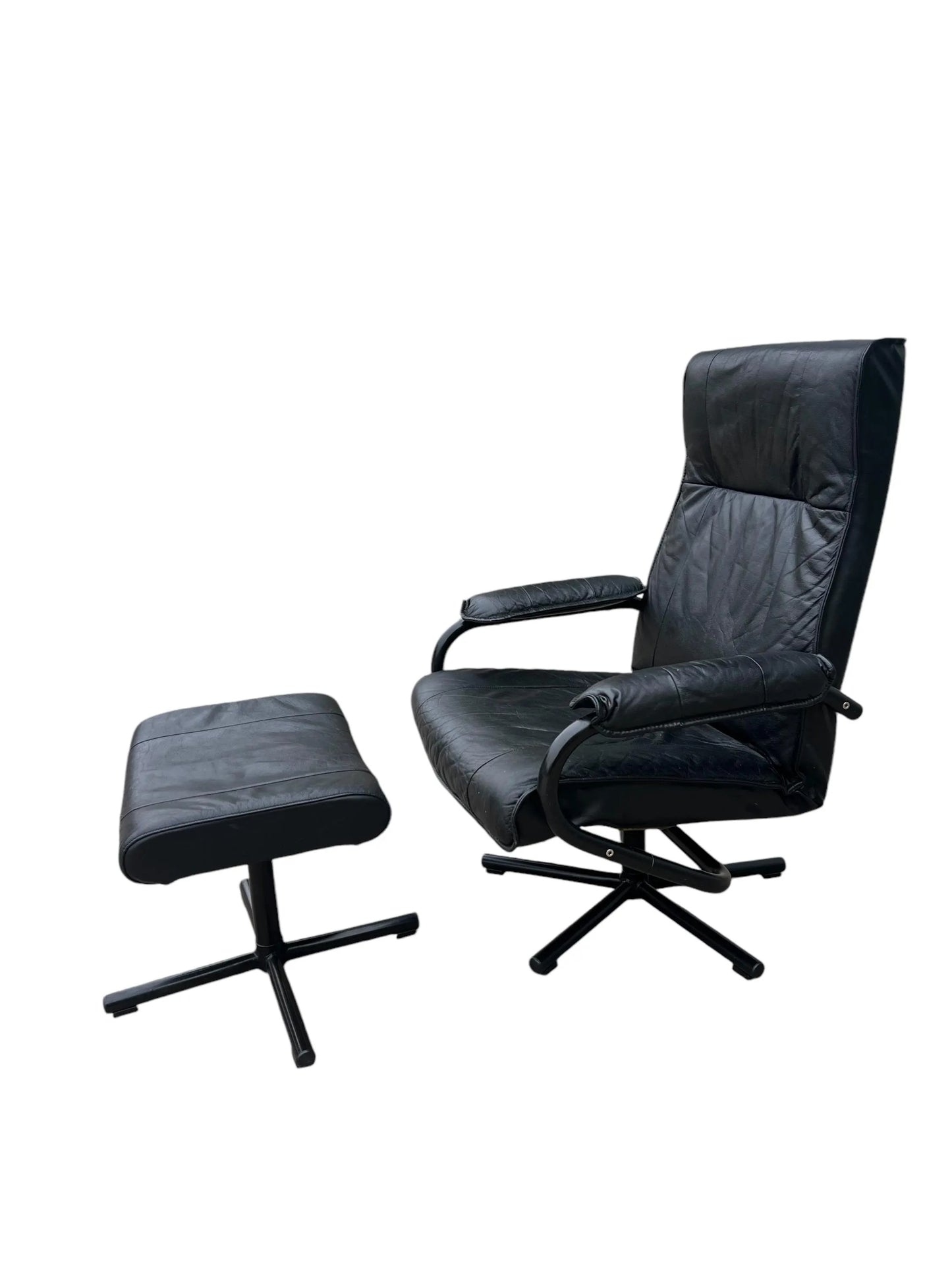 Black Mid century recliner swivel chair and stool in the manner of Kebe Mobler