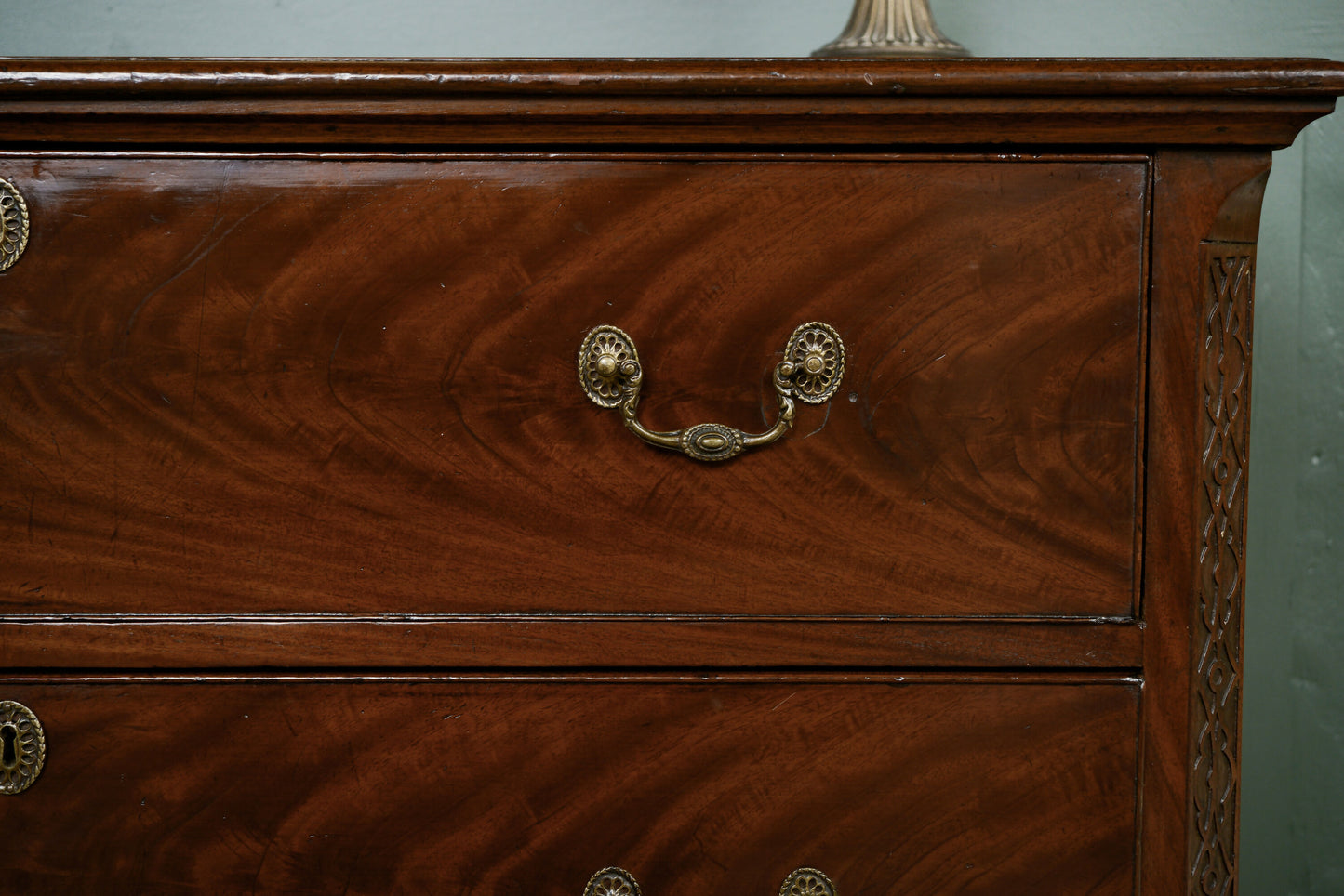 Mahogany Chest of Drawers on Raised Supports with Fretwork Decoration
