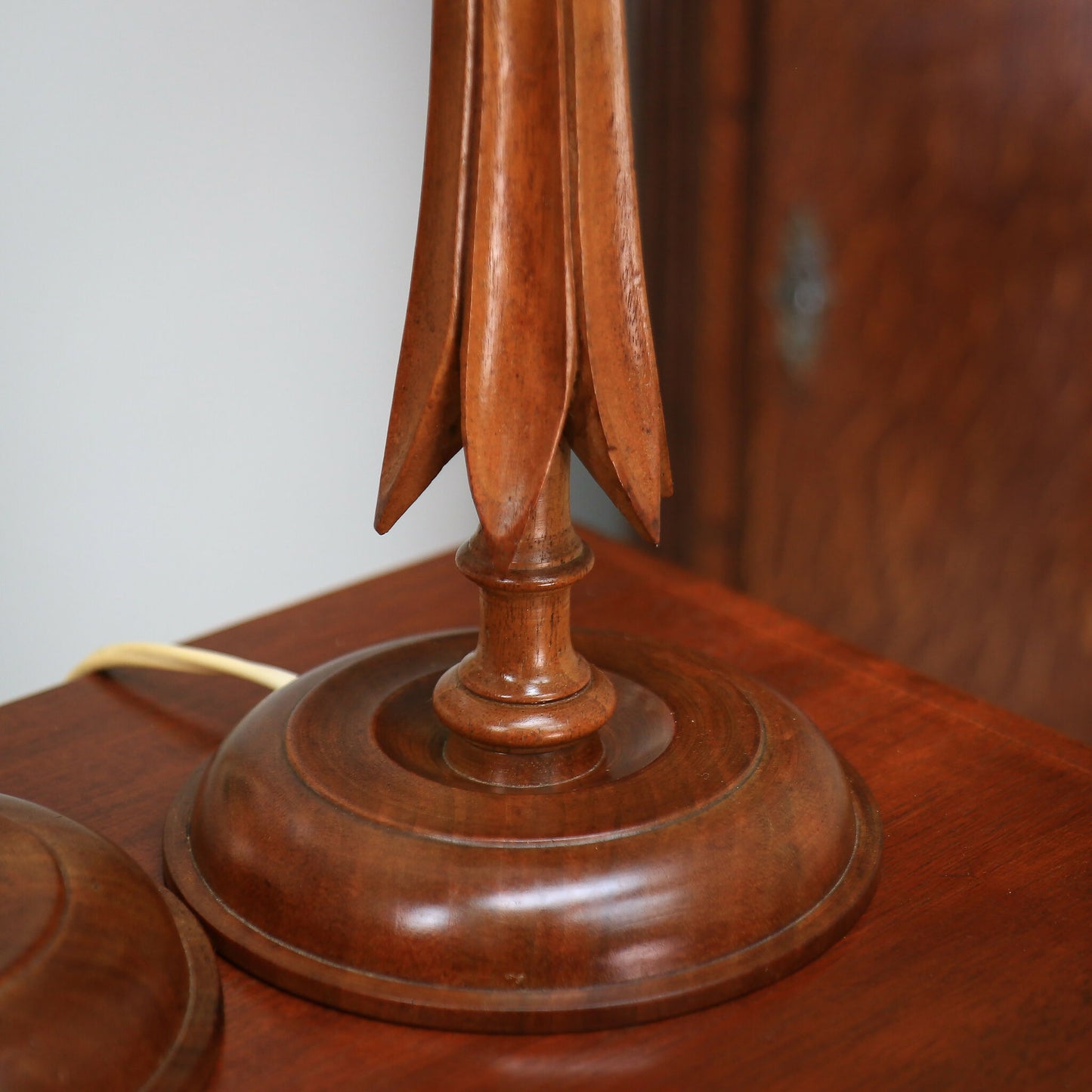 A Pair of Wooden Carved Walnut Table lamps