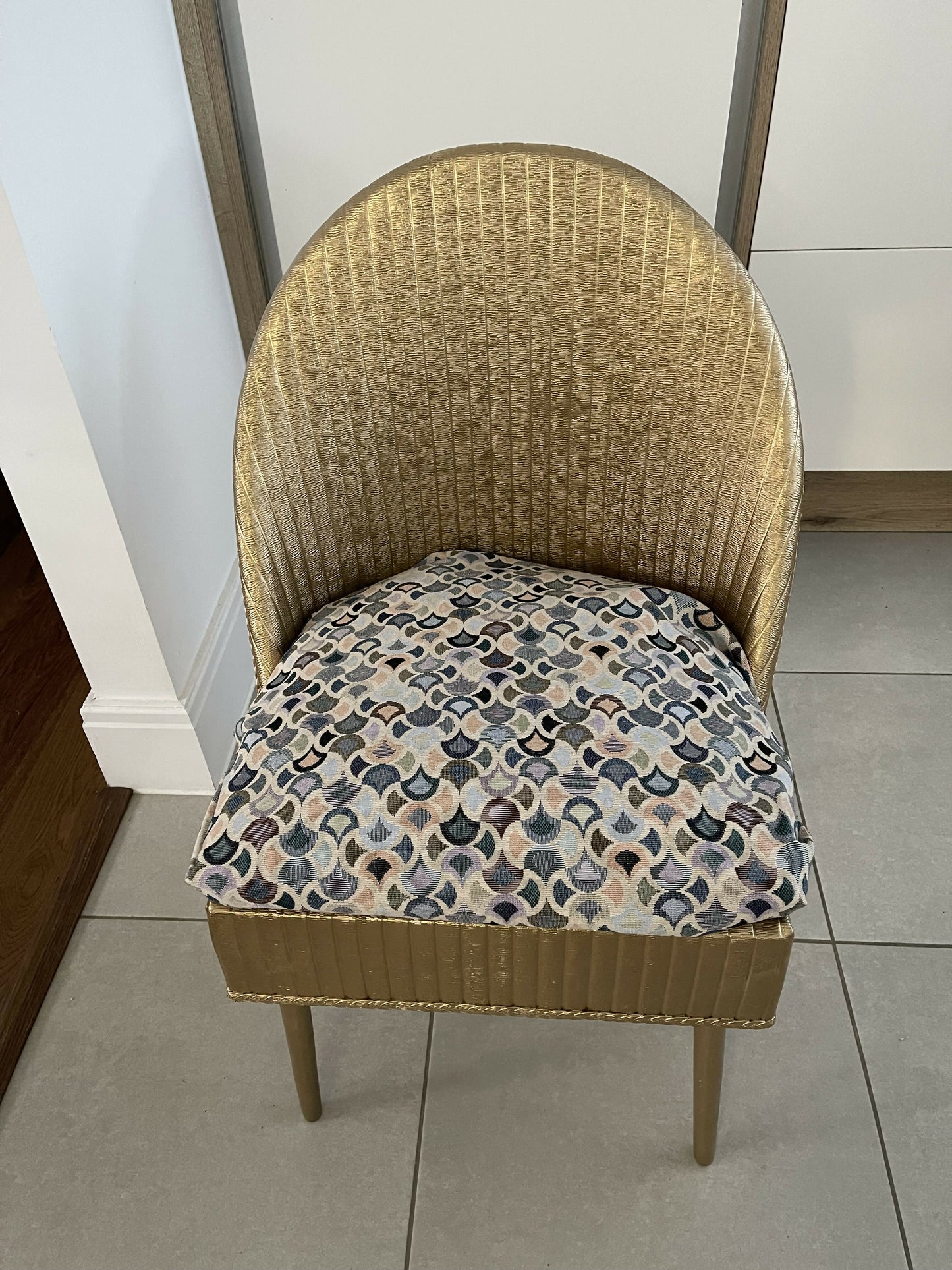 Accent chair. Gold painted wipe clean plastic with your choice of fabric seat. Removable with small storage space beneath.