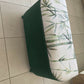 Lloyd loom ottoman. Matt Forest Green paint and matching bamboo motif fabric