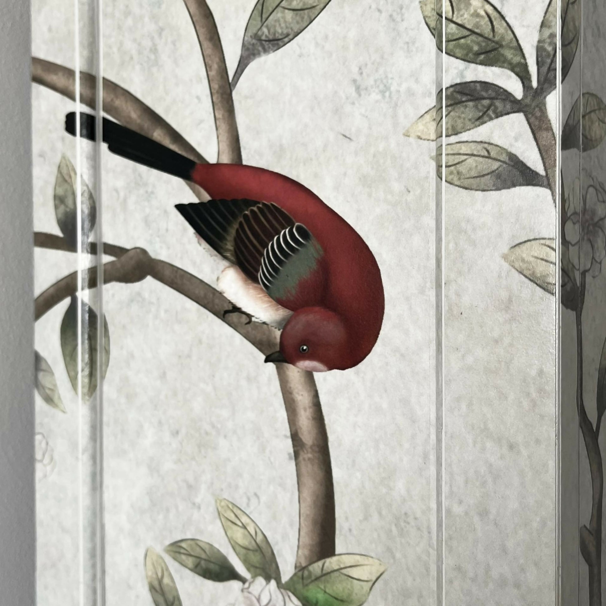 Red bird on the wall of vintage chinese cabinet