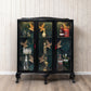 Available: Exquisite Art Deco drinks cabinet decoupaged in a striking blend of emerald green, subltle gold and black crane fabric.