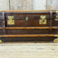 Antique full leather and brass bound travel trunk coffee table