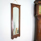 A Pair of Victorian Wall Mirrors Bevel Edged Glass Carved Top and Bottom