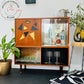 MCM Cocktail drinks cabinet in black and gold geometric retro pattern