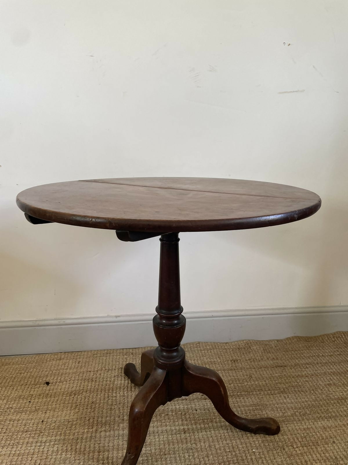 An Antique Oak Tripod Table
