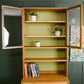 G Plan Sierra Wall Unit with Glass Doors and Green Backboard