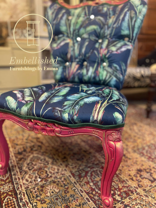 Bold statement accent chair. Pinks,blues and golds