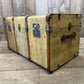 antique beige leather banded travel trunk with keys