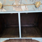 Vintage pale blue and gold drawered cupboard.