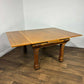 Early 20th Century Golden Oak Draw Leaf Dining Table