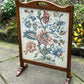 A RUPERT / NIGEL GRIFFITHS MONASTIC CARVED OAK FIRE SCREEN / STAND