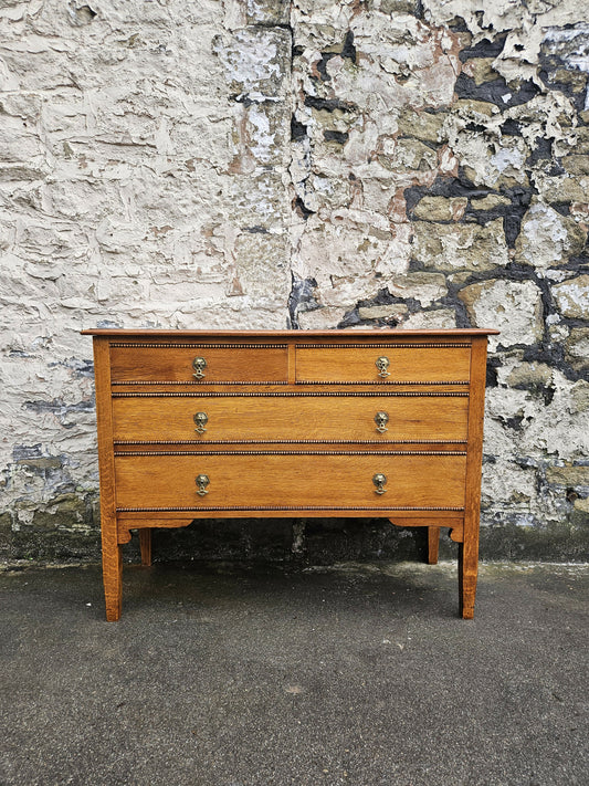 Vintage Oak Tallboy Chest of Drawers: Antique Cabinet with Detailing Four Drawer