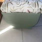 Small mid century Ottoman storage and seat. Sage green paint makes you choose the material.