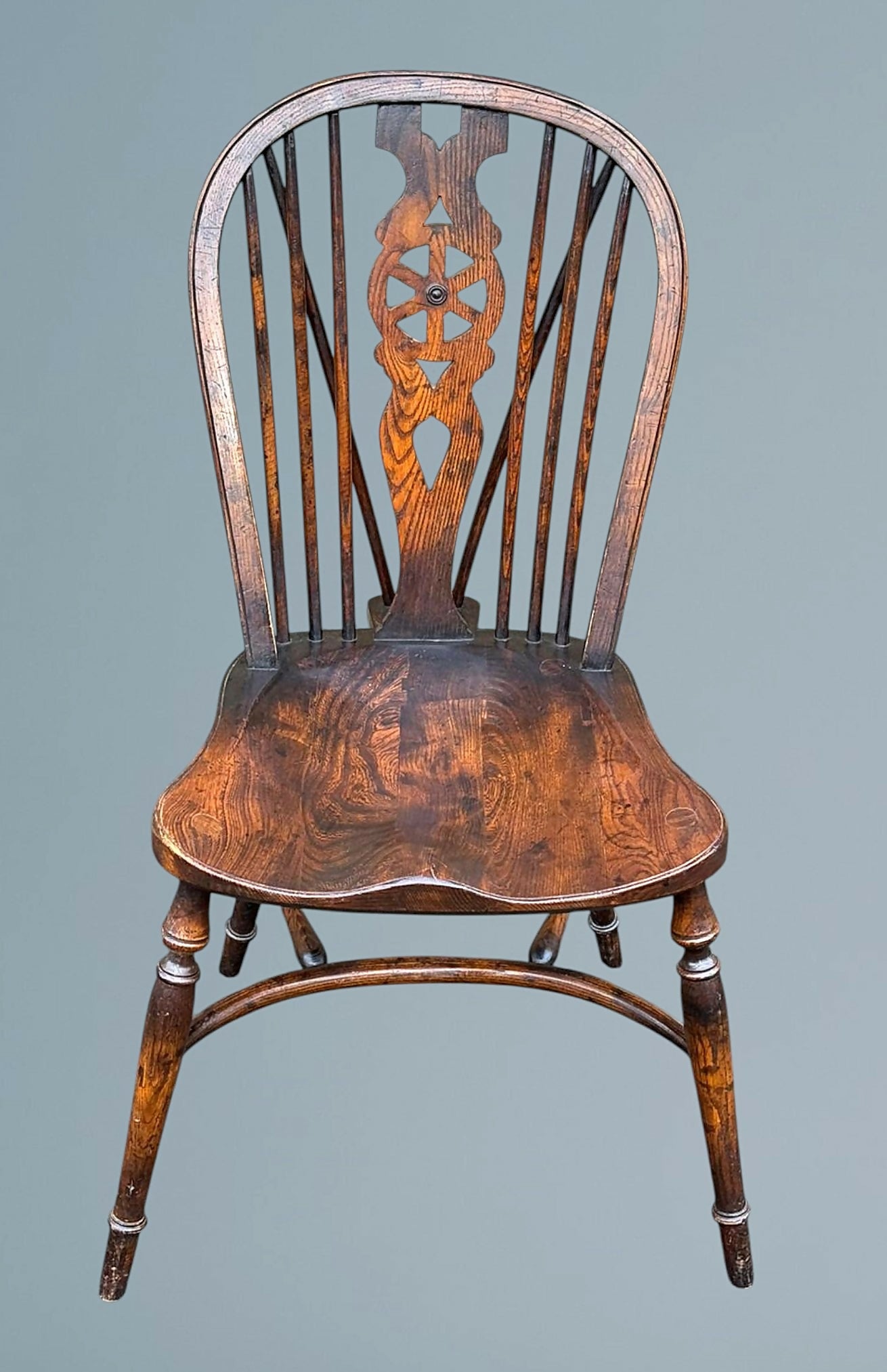 Set of Four Elm Wheel Back Windsor Chairs