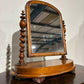 Victorian walnut dressing table mirror, supported on turned carved supports.