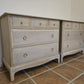 Pair Stag minstrel chest of drawers