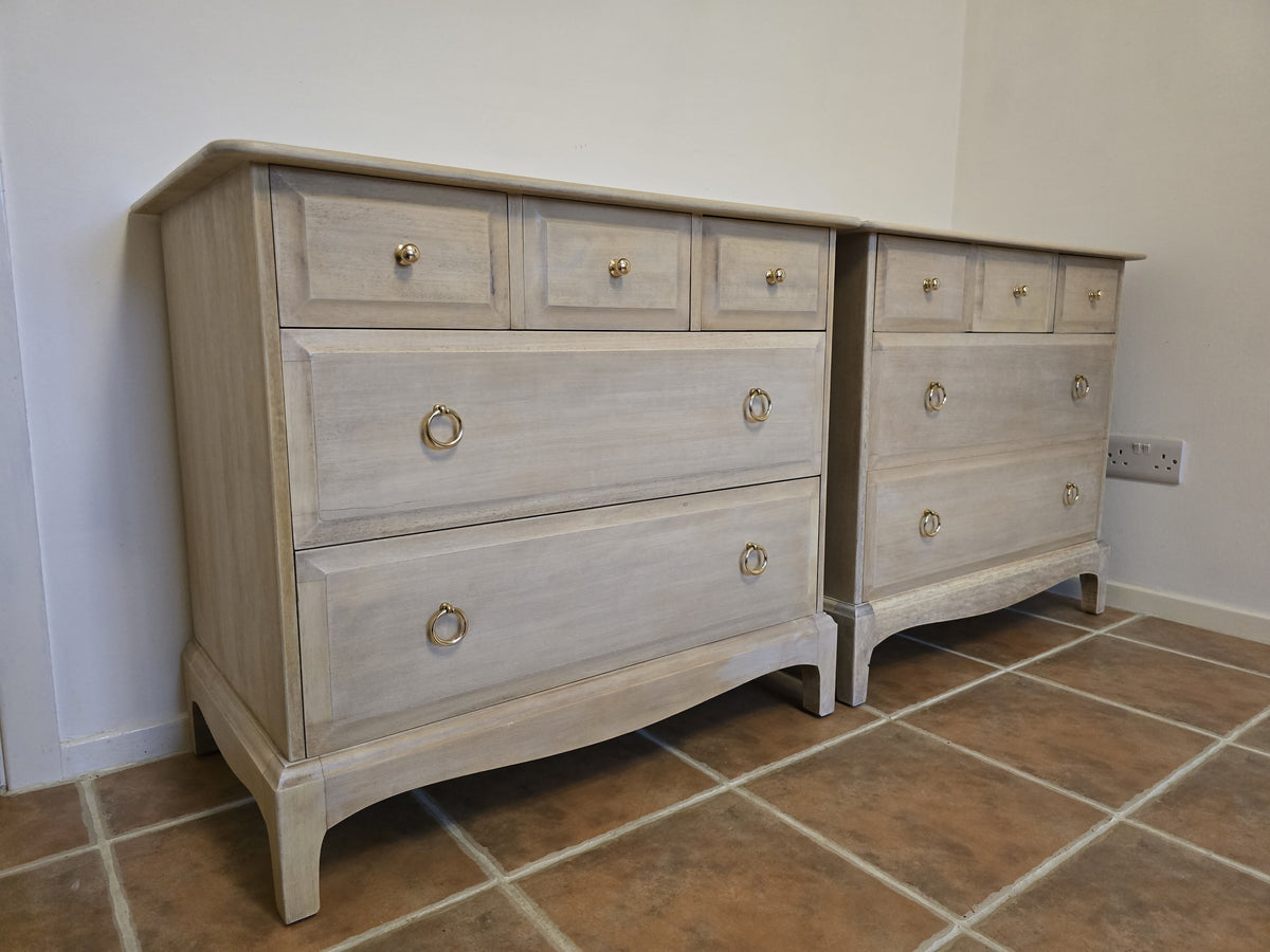 Pair Stag minstrel chest of drawers