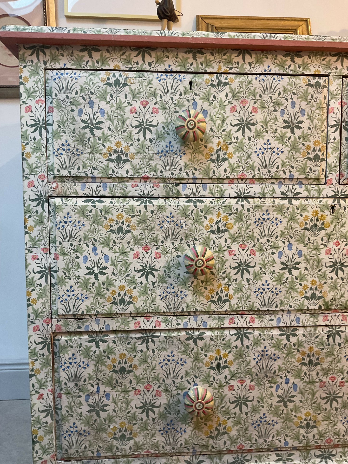 Antique chest of drawers covered in William Morris decoupage. With hand painted handles.