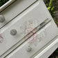 Stag Minstrel beside cabinet with 2 drawers & pullout tray painted in clotted cream