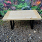 Wooden table with metal "box" legs