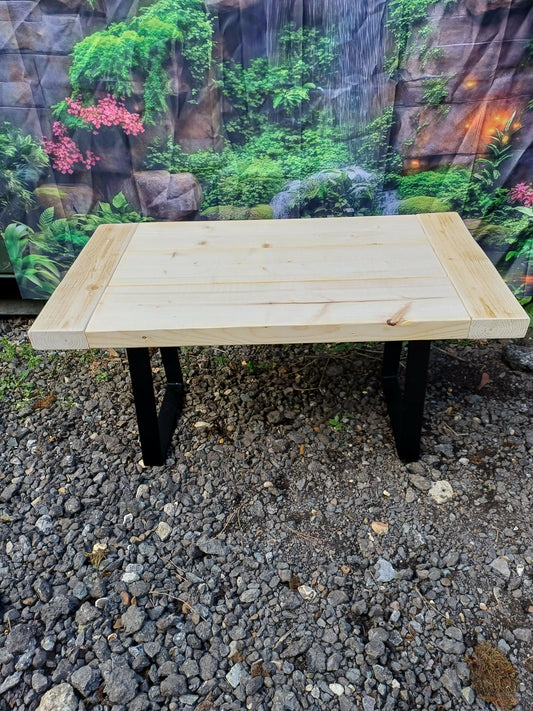 Wooden table with metal "box" legs