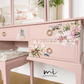 Dusky blush pink Stag Minstrel dressing table set with blossom and butterfly design.