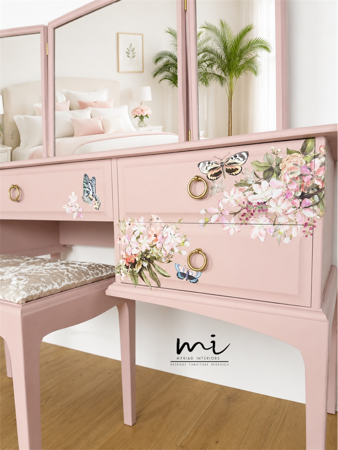 Dusky blush pink Stag Minstrel dressing table set with blossom and butterfly design.