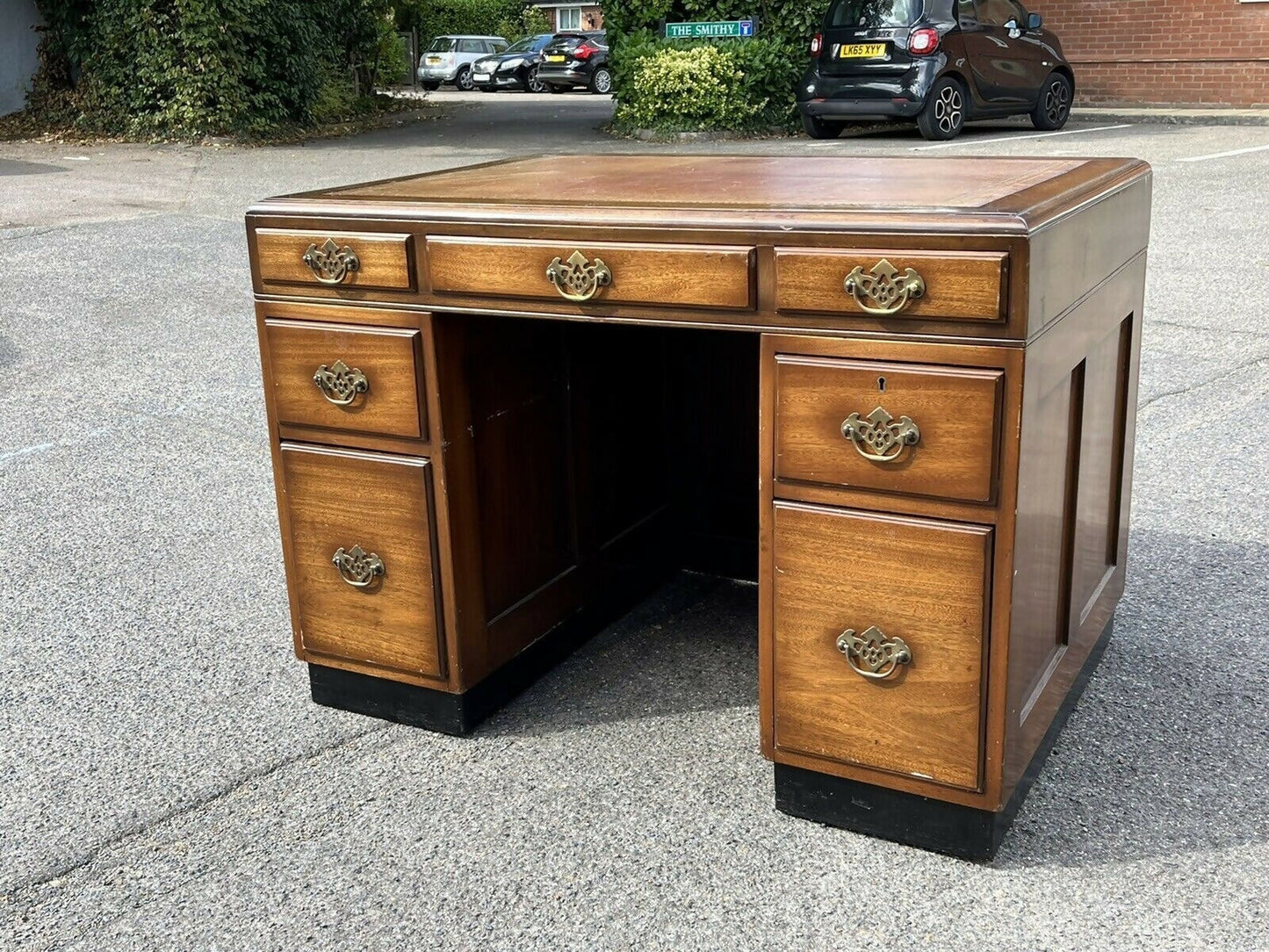 Mahogany Desk, Brass Handles, Panelled Sides & Rear.