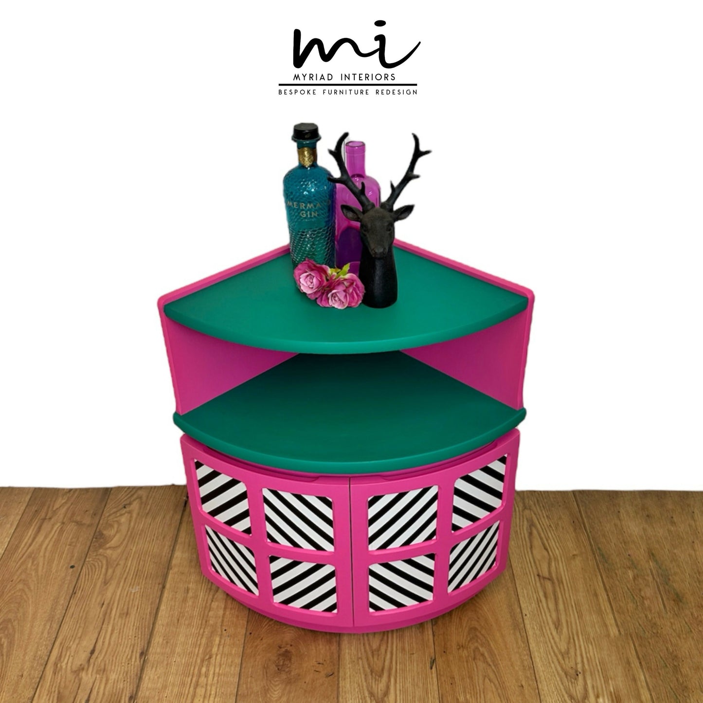 Maximalist hot pink and turquoise Nathan corner cabinet with black and white geometric design, mid century modern, bold, bright, statement