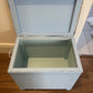 Bijou ottoman seat sky blue with Peter Rabbit themed upholstery. 45cm high 45cm long 30cm deep