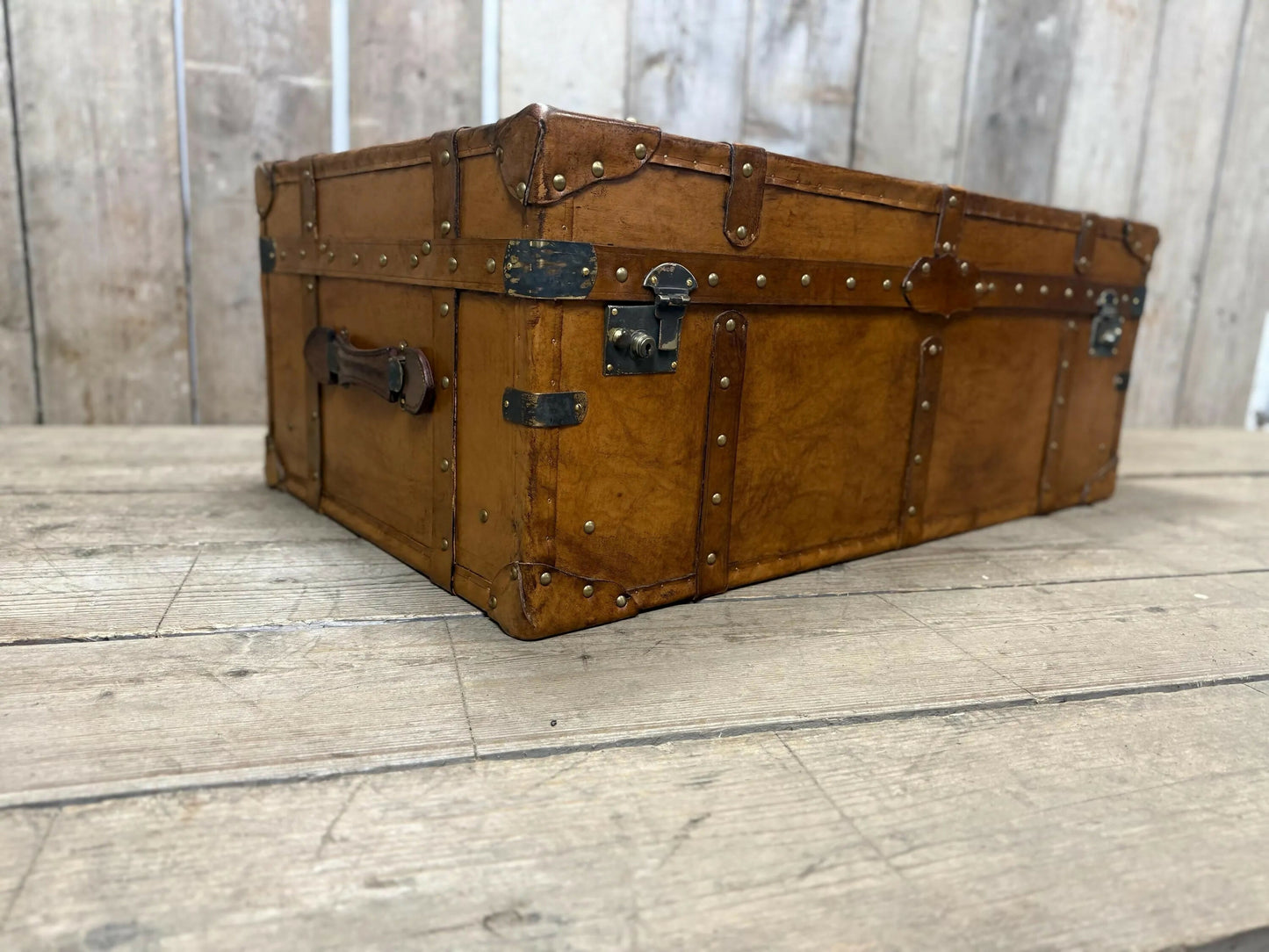 luxury tan leather coffee table trunk.