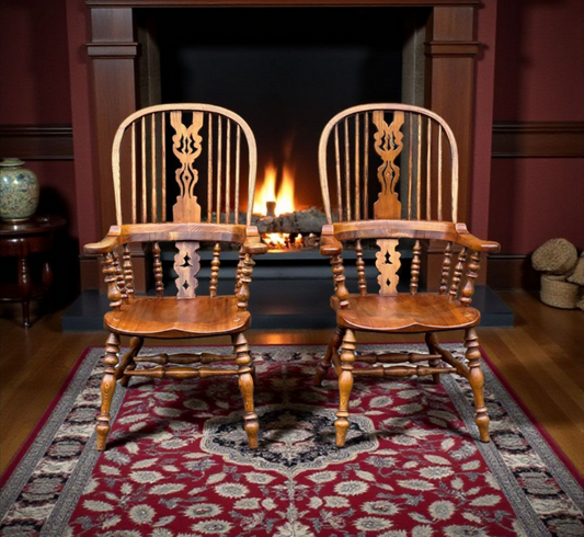 A Large Pair of Ash Broad Arm Windsor Chairs