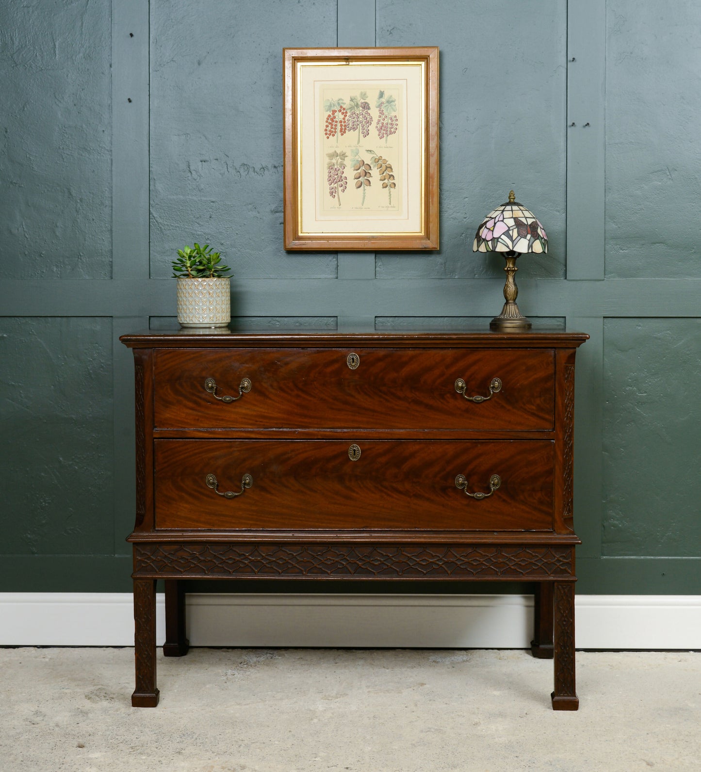 Mahogany Chest of Drawers on Raised Supports with Fretwork Decoration